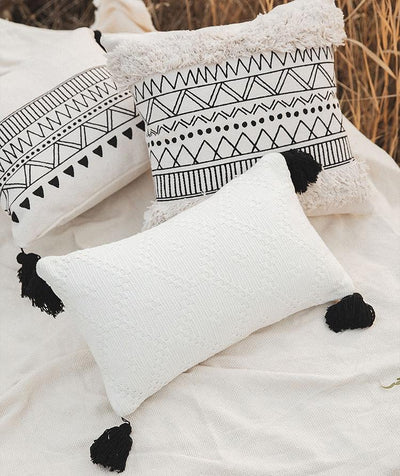 Coussin Macramé Norma Atelier Macramé trois coussins dans un champ de blé