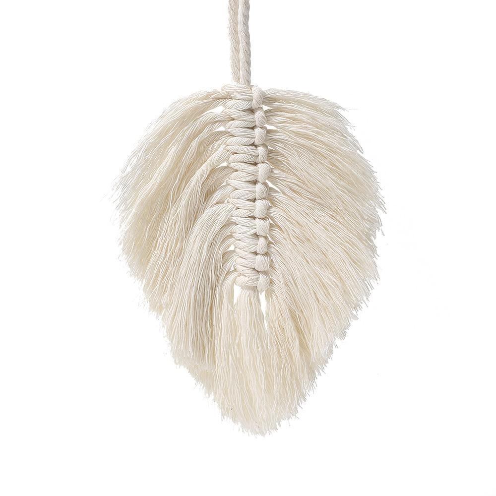 Embrasse Rideau en Tissue Olivine Atelier Macramé sur fond blanc avec une feuille en coton