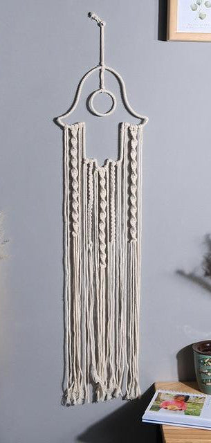 Macramé Mural Fatma Atelier Macramé sur un mur gris