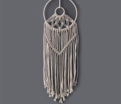 Macramé Mural Milan Atelier Macramé sur un mur gris