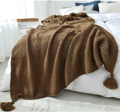 Plaid Macramé sur un lit