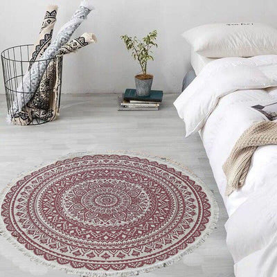 Tapis macrame Ariana Atelier Macrame dans une chambre avec un lit blanc