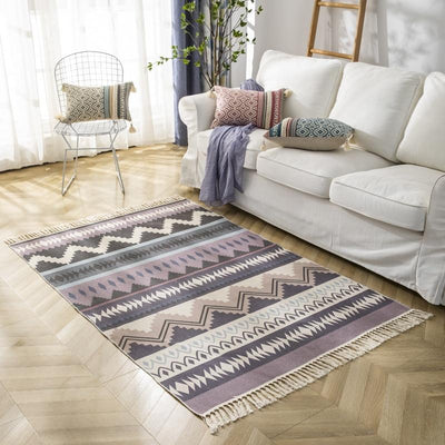 Tapis Macramé Poema Atelier Macramé dans un salon avec un canapé blanc